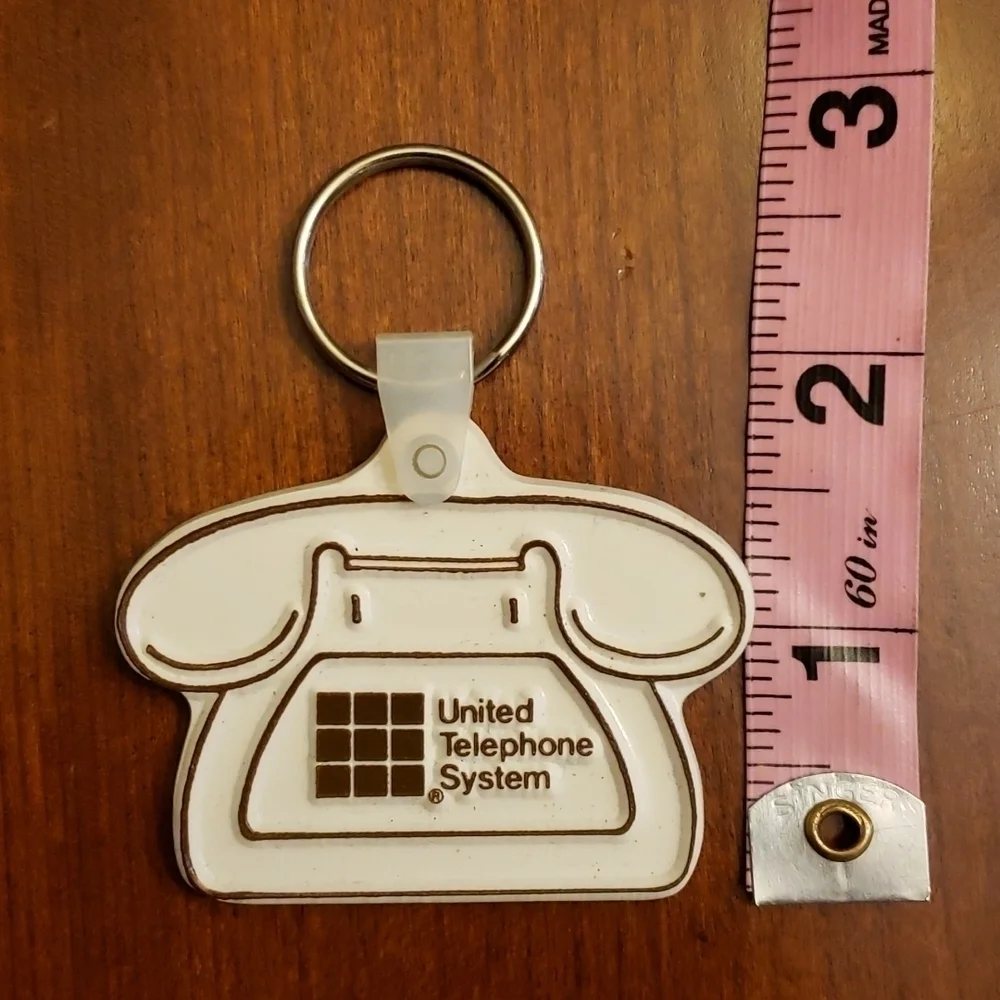 VINTAGE United Telephone Plastic Keychain